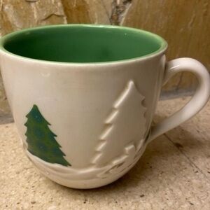 STARBUCKS Winter holiday scene 16oz mug in cream and green. Vintage 2006